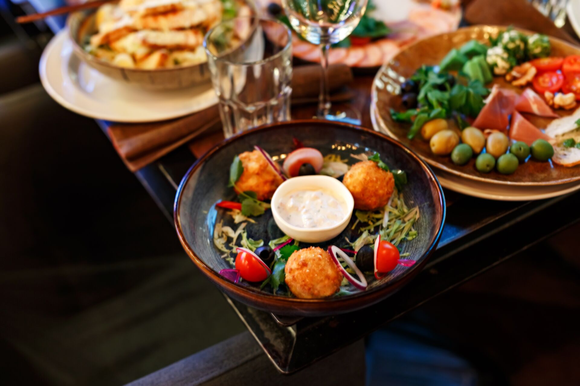 Table with tasty pub food served