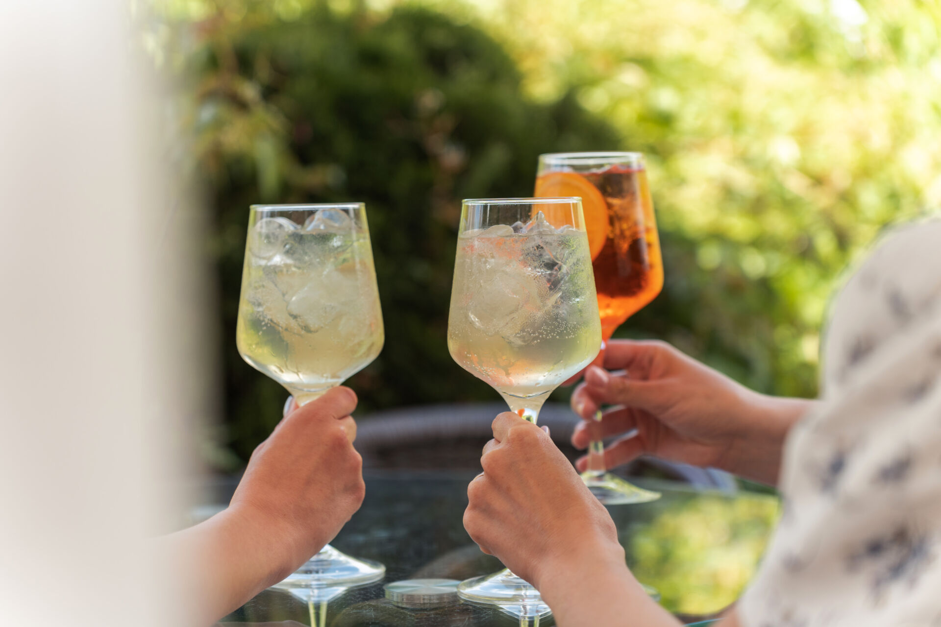 Refreshing drinks with ice on a sunny day