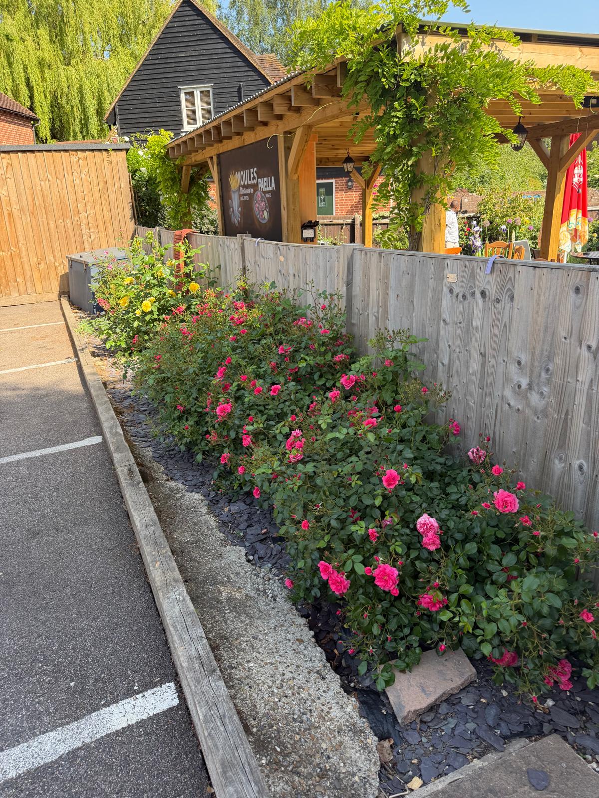 The Red Lion Inn Bridge car park and view of covered beer garden and pergola